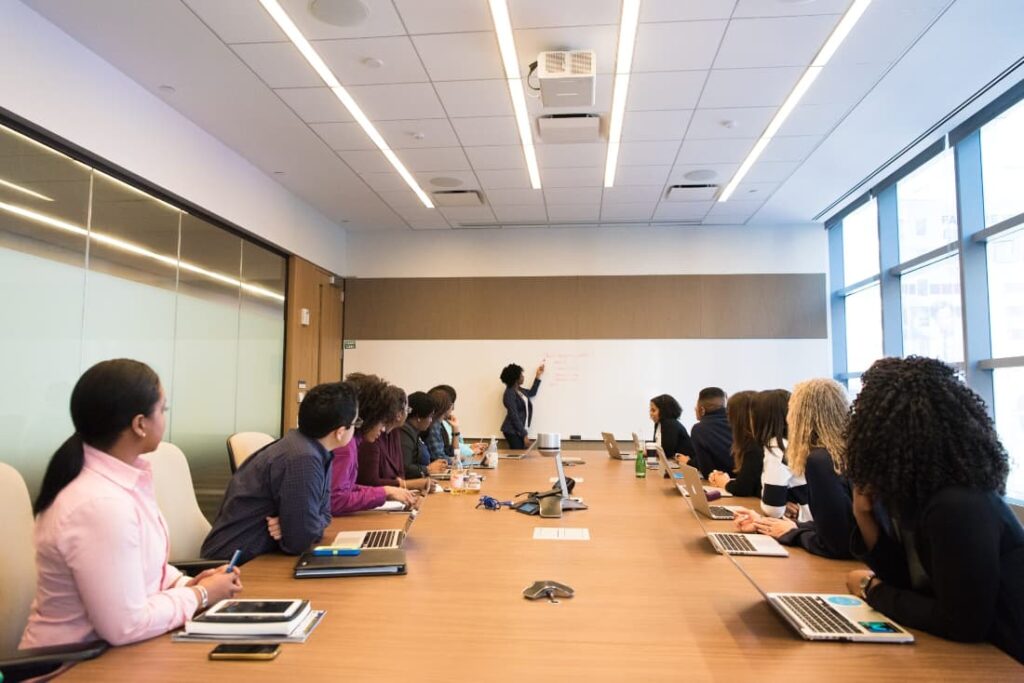 People attending a business presentation at a conference room