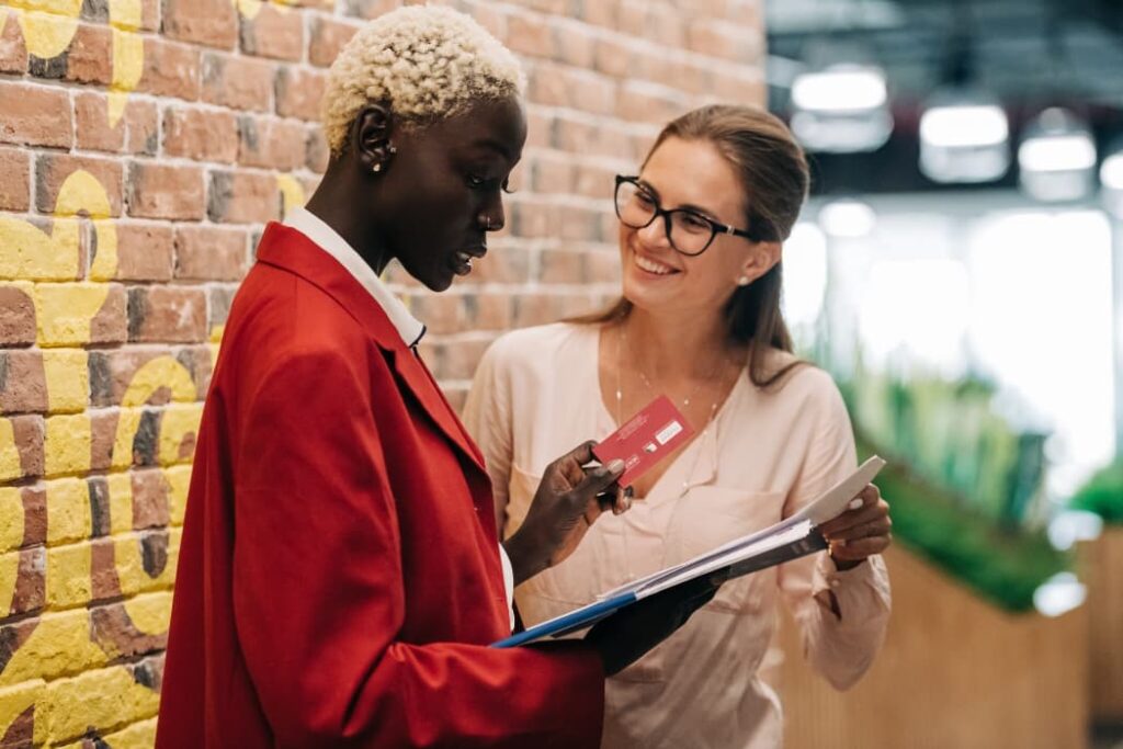 Two women networking in a business setting