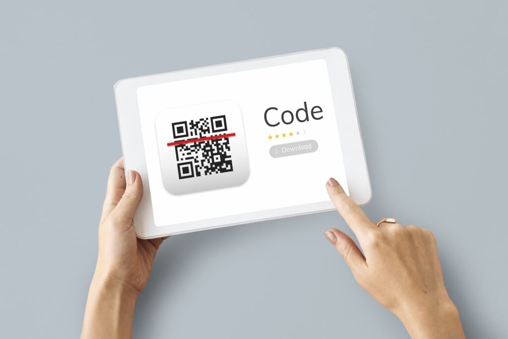 Woman doing a QR code test on a tablet